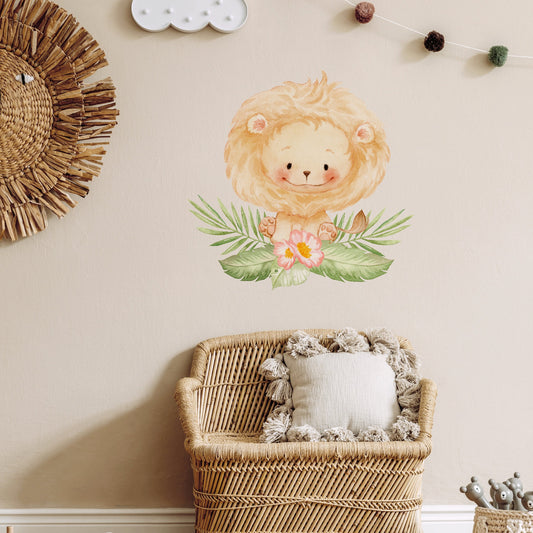 Baby Lion Nursery Wall Sticker in a Boho Nursery with a rattan chair and rattan lion wall decoration.